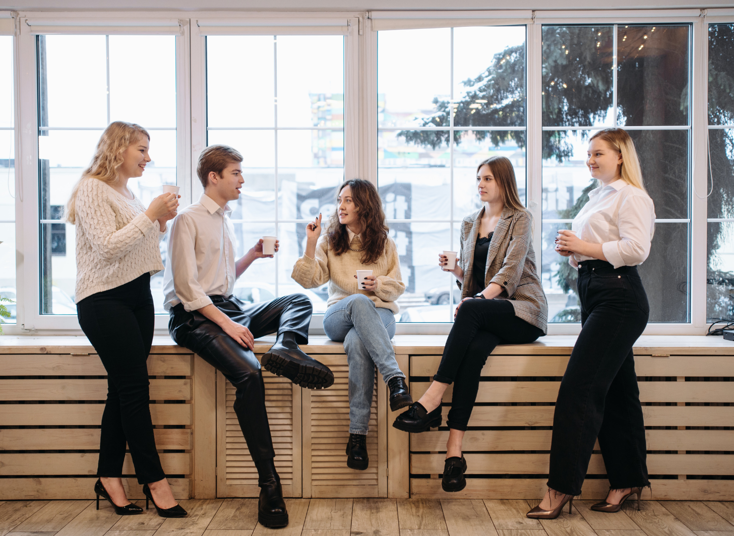 people drinking coffee at office
