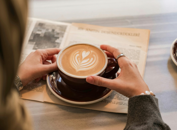 Person holding coffee